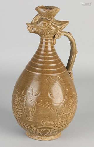 Chinese earthenware jug with green / brown glaze,