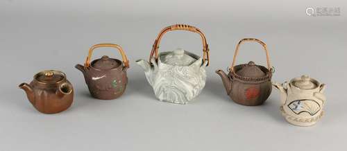 Five ancient Chinese Banko Earthenware jars pull.