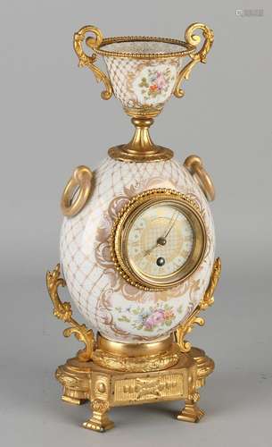 19th Century French porcelain vase pendulum. With gilt