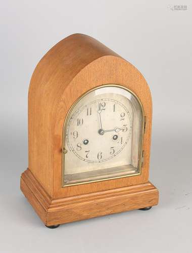 German oak table clock with plated brass dial. Circa