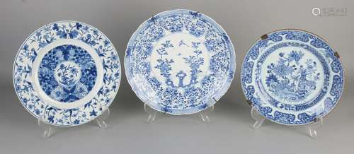 Three antique blue and white Chinese porcelain plates.