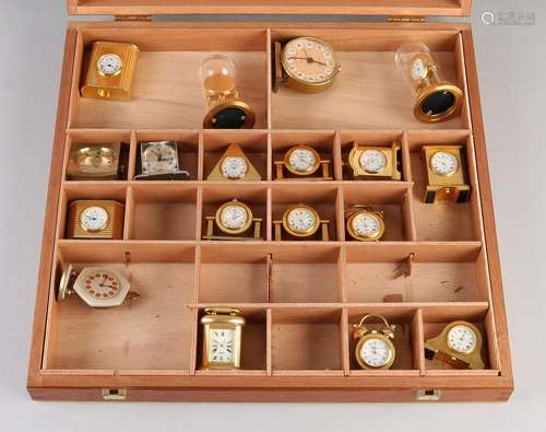 Box with gold-plated miniature clocks. 20th century.