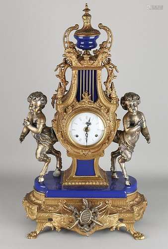 Italian imperial bronze mantel clock with fauns and