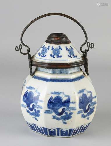 Chinese porcelain octagonal lidded with brass frame.