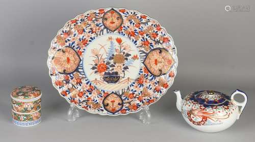 Three parts 19th century Imari porcelain. Several sets.