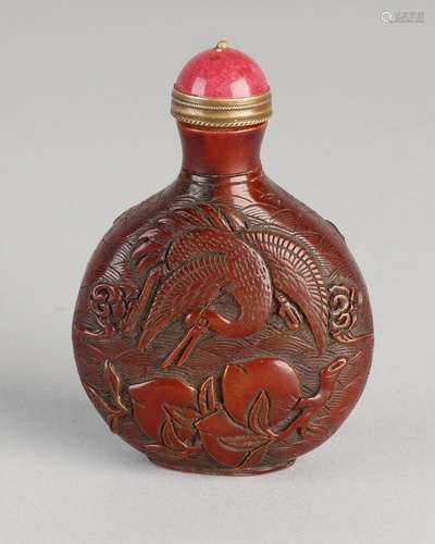 Ancient stone carved Chinese snuff bottle with crane