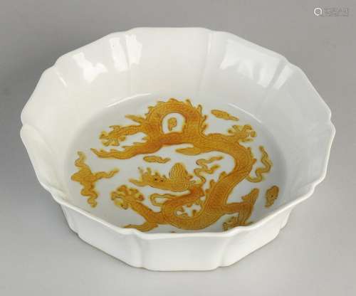 Chinese white glazed porcelain bowl with orange dragon