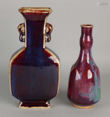 Two Chinese porcelain vases with red / brown / blue