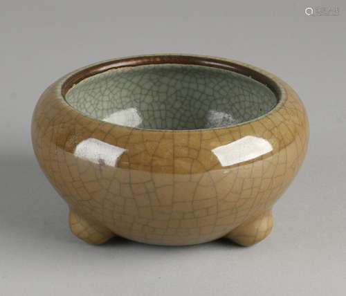 Chinese celadon pot on three legs, with brown / gray