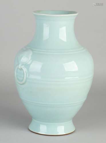 Light blue glazed Chinese porcelain vase with bottom