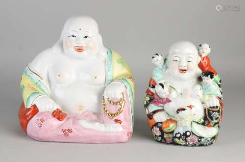 Two Chinese porcelain smiling Buddhas. 20th century.