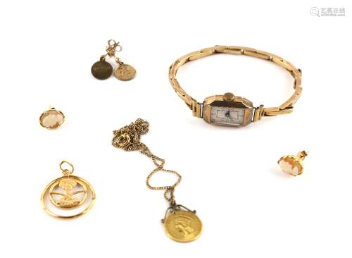 Mixed group of gold items, including a Saudi Arabian coat of arm pendant, stamped 18 ct, 1873 Indian