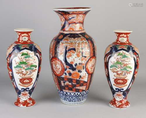 Three large 19th century Imari porcelain vases with