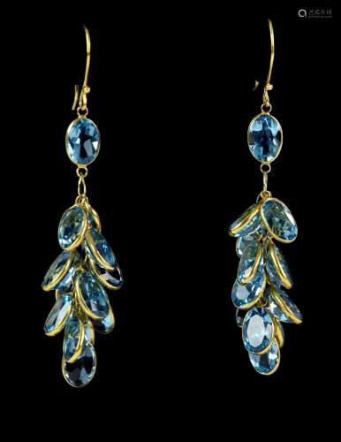 Blue topaz drop earrings; oval faceted blue topaz collet set in a 'grape' style setting, 4.5cm drop,