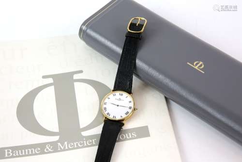 Baume Mercier a Gentleman's reference 15172 gold dress watch , the circular white enamel dial with