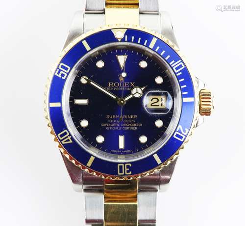 A Rolex Submariner gentleman’s automatic wristwatch, stainless steel case, the rotating blue ceramic