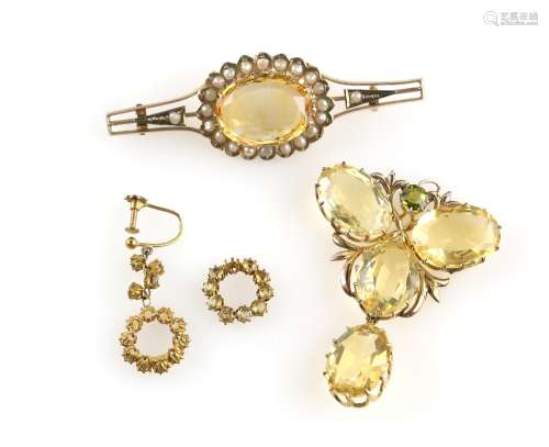 Citrine set jewellery, a pendant set with four oval cut each oval cut approximately 14 x 10mm,
