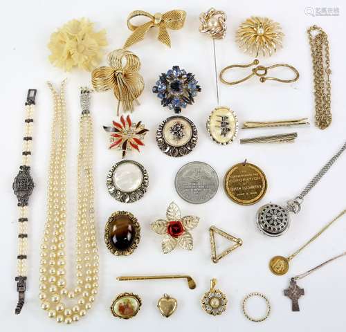 A group of costume jewellery, including faux pearls, brooches, silver chain and cross pendant,