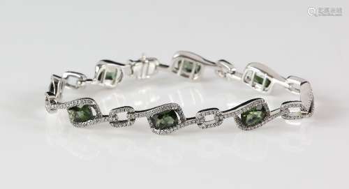 Contemporary green tourmaline and diamond bracelet; eight rectangular faceted tourmalines