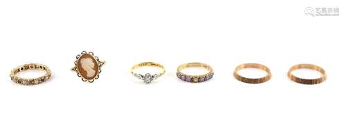 Six vintage gold rings, solitaire diamond, mount stamped 18 ct and platinum, half eternity ring