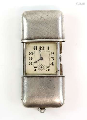 A silver ladies fob watch of rectangular outline, the case sliding open to reveal a square dial with