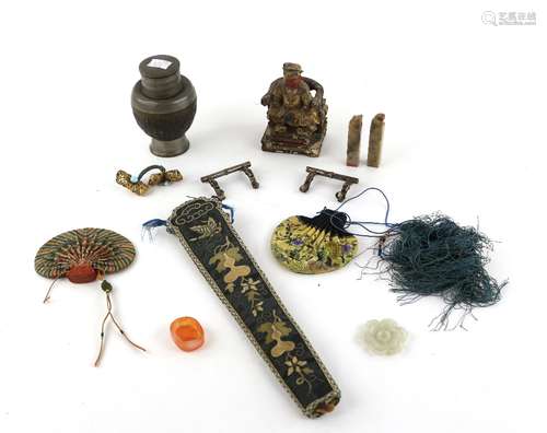 A Chinese textile case, 31 cm long; two small textile bags, each about 10cm diameter; a pair of