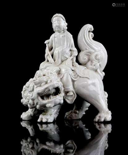 A Blanc-de-Chine style figure of a Bodhisattva, possibly Manjushri [Chinese: Wenshu] riding on the