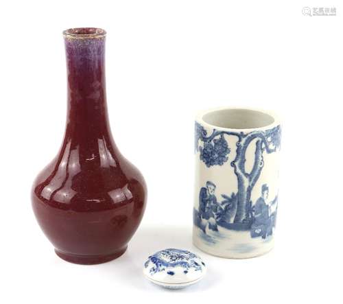 A blue and white bitong of cylindrical form; the base with six-character mark, 12 cm high;