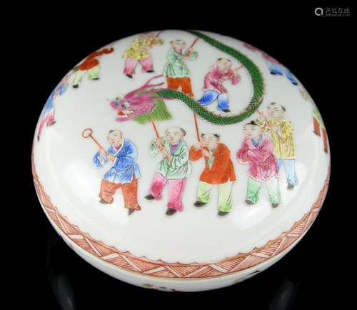 A famille rose circular box and cover, decorated with a procession of Manchu/Chinese boys carrying a