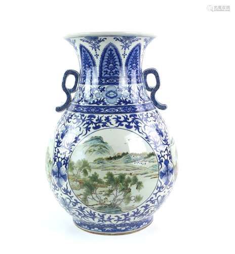 A large underglaze blue and famille rose decorated vase with flaring, trumpet rim and curvilinear