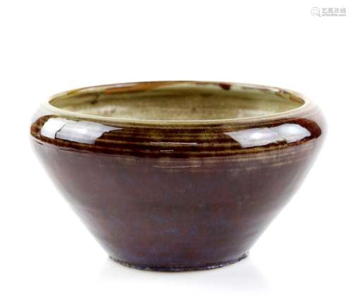 A mottled red glazed bowl with unglazed base, 19 cm diameter; together with a Satsuma bowl of