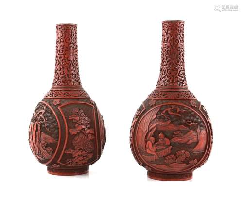 A pair of red cinnabar lacquer vases; each one with cylindrical neck, and decorated with panels of