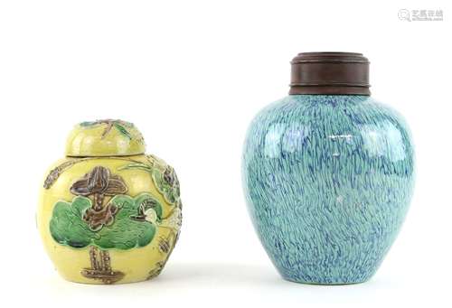 Two oviform vases, comprising: one in mottled 'Robin's Egg' blue [chun yu] with a wood cover, 15