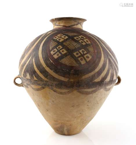 A Gansu style jar or urn, decorated in the Yangshao phase style with bold circular motifs containing