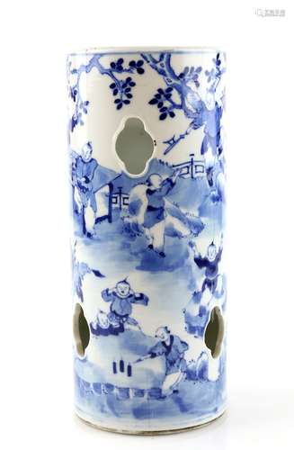 A blue and white hat stand of typical cylindrical and reticulated form, decorated with Manchu/