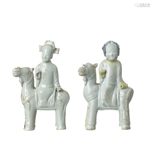 Pair of figures on horseback in Chinese ston…