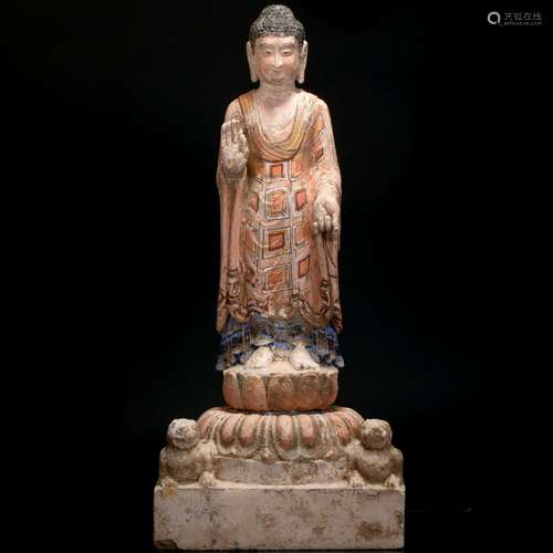 Colored Sakyamuni stone sculpture from Tang