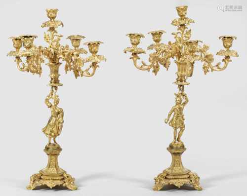 Paar große Belle Epoque-PrunkgirandolenGegenstücke. 5-flg.; Bronze, vergoldet. Vollplastisch