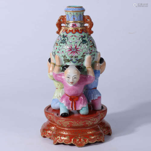 A Chinese Famille Rose Porcelain Child Statue