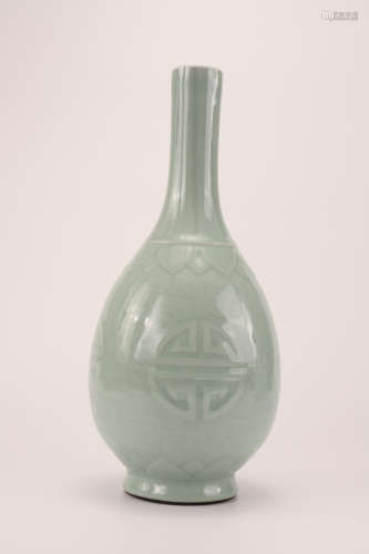 A Chinese Celadon Glazed Carved Porcelain Vase