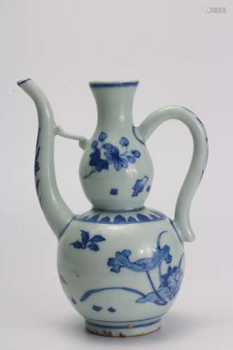 A Chinese Floral Blue and White Porcelain Pot with Handle