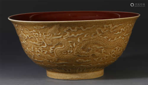 CHINESE PORCELAIN RED AND GLAZE CARVED DRAGON BOWL