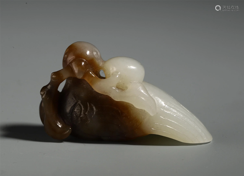 A FINELY CHINESE ARCHAISTIC JADE CARVE…