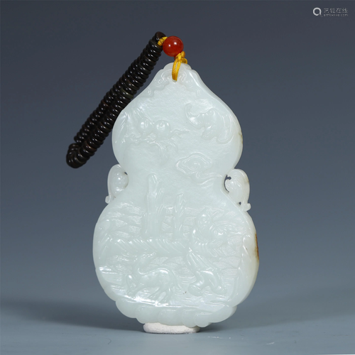 A CHINESE HETIAN WHITE JADE CARVED GO…