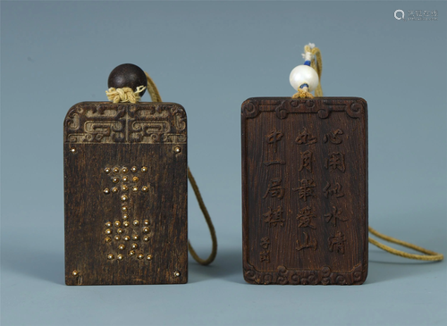 A PAIR OF CHINESE AGALWOOD CARVEDING…