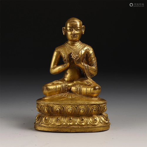 A LARGE CHINESE GILT BRONZE SEATED GU…