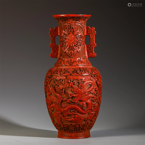 A CHINESE CINNABAR CARVED DRA…