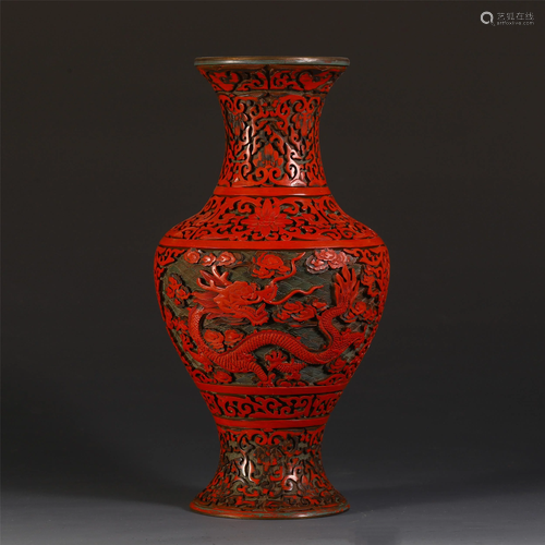 A CHINESE CINNABAR CARVED DRA…