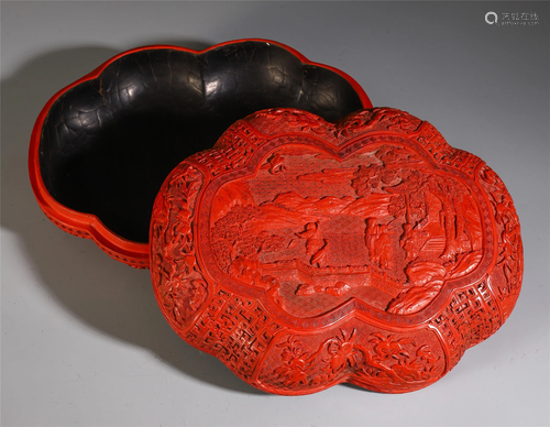 A FINELY CHINESE CINNABAR CARVED FIGU…