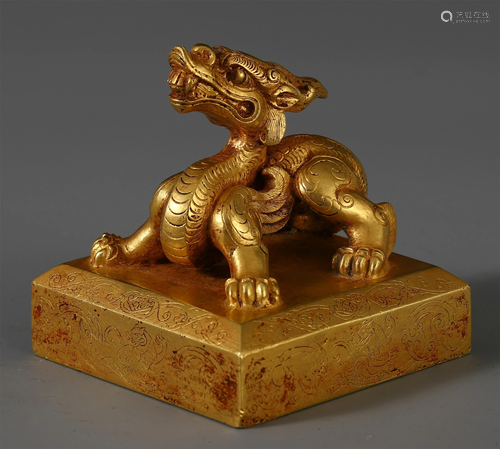 A RARE CHINESE PURE GOLD CARVED DRA…